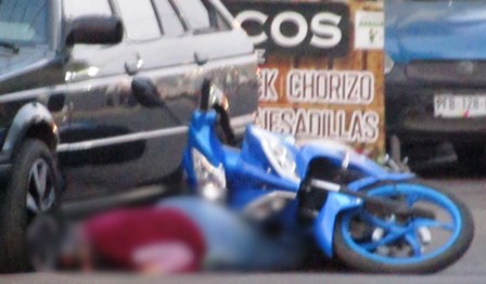 Mujer motociclista es 3011