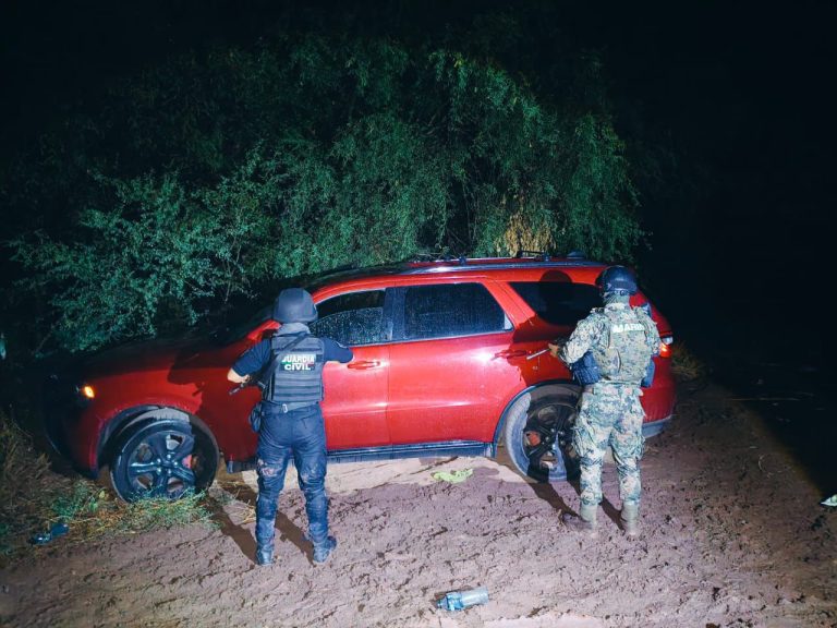 En Arteaga, SSP y Marina aseguran dos vehículos, equipo táctico y 850 cajas de calzado